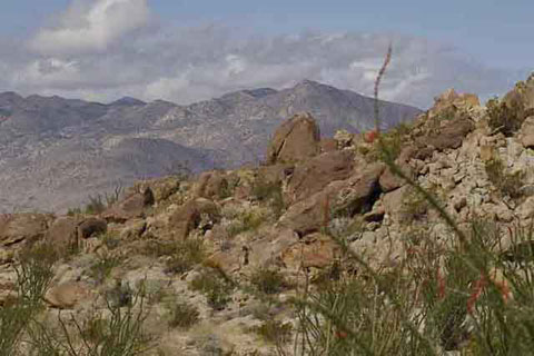 Photo of brown and blue mountain seen from Alcoholic Pass