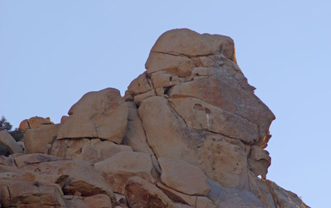 Photo of one of the two large face-shaped boulders that give Dos Cabezas (two heads) its name