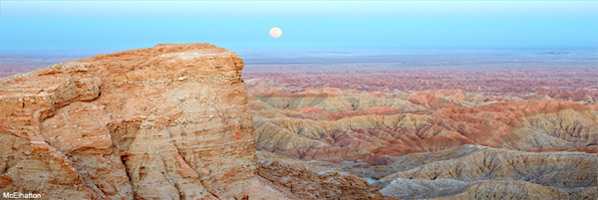 full moon rising over fonts point anza borrego desert